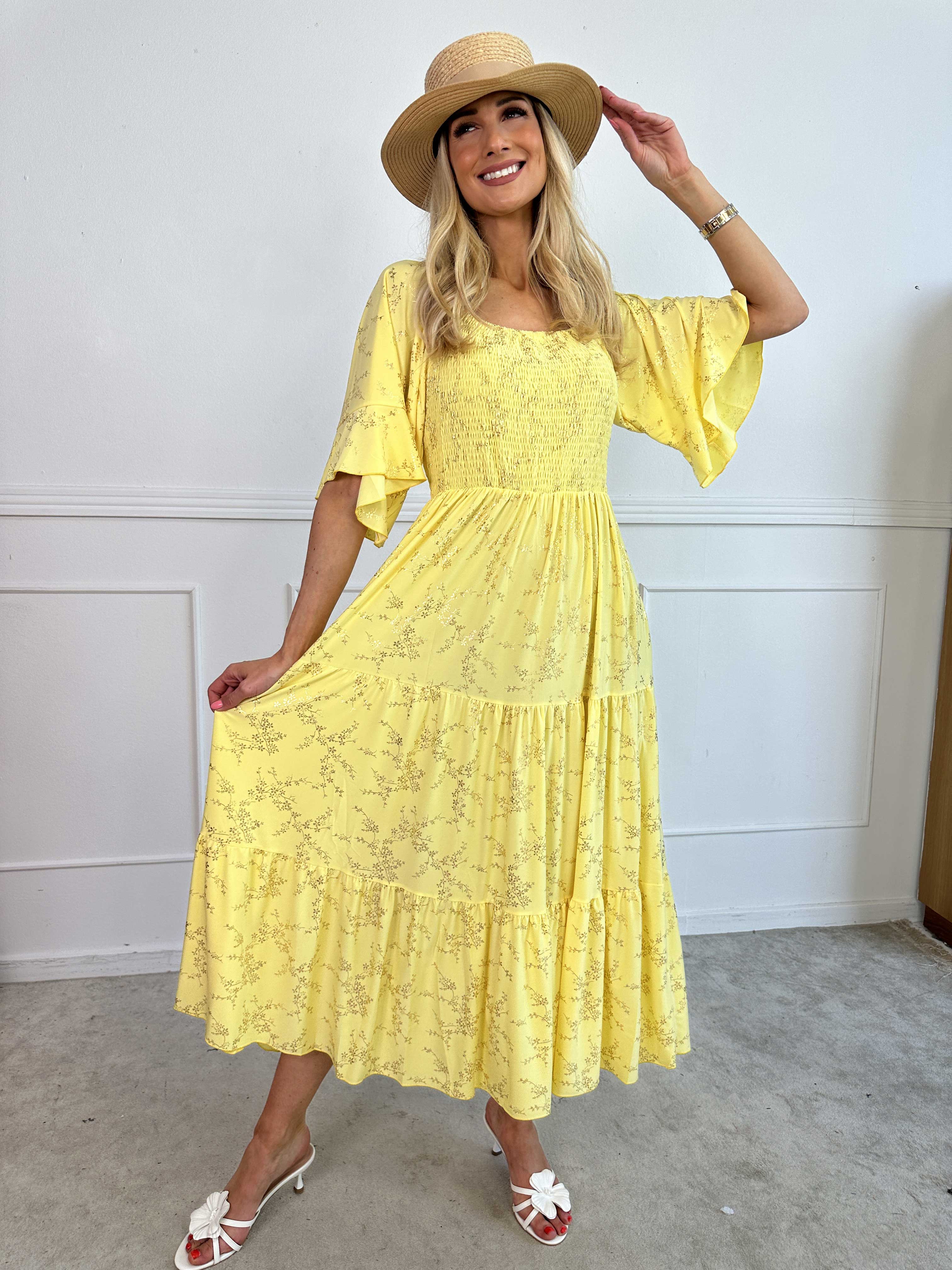 Elna Gold - Ensfarvet elastisk kjole med smock og guld print